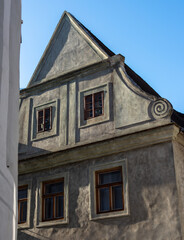 Fototapeta na wymiar Facades of historic buildings in Český Krumlov, also Bohemian Krumau, Krumau an der Moldau or Krummau, is a city in southern Bohemia (Czech Republic).