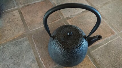 Fototapeta na wymiar Tetsubin - Japanese cast iron tea kettle 