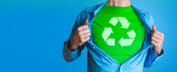 Man chest green superhero of Recycling Symbol in t-shirt Isolated on clean background. Protect and save Earth Planet