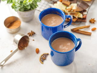 Cozy composition - two cups of coffee, sweets, decor on a white background. Menu design, romance, date, surprises, gifts. Culinary blog, instagram, advertising, banner, invitation.