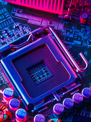 The desktop of the processor lies with the contacts up on the motherboard of a personal computer. Illuminated with blue neon light. Technological background. Computer parts, repair, new technologies. - 482086860
