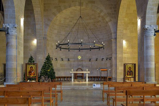 Interior of Tabgha or Church of the Multiplication of the Loaves and Fishes at Christmas with decorations. Church on the Sea of Galilee in Israel.
