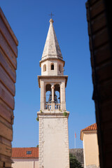 Fototapeta premium The bell tower of the St Ivan church in the old town of Budva