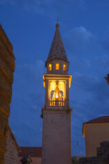 Night view of the bell tower of the St Ivan church in the old town of Budva