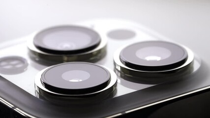 Macro advertising footage, exterior design. Apple new smartphone with triple-lens camera - Ultra Wide, Wide and Telephoto