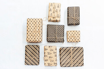 Handmade paper gift boxes on white background. Ecological concept.top view