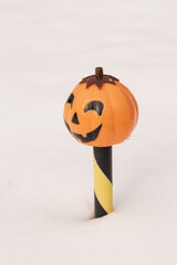 Halloween Pumpkin stuck in the snow