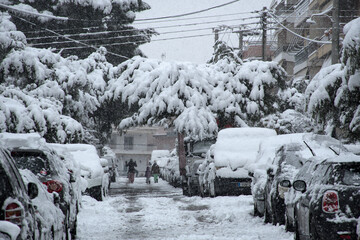 Unusually heavy snow blankets in city of Athens. Greece Ilioupoli.