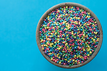 Brightly Colored Candy Dots in a Bowl