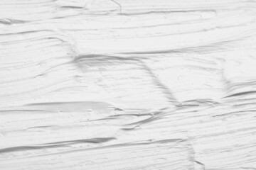 Texture of white oil paint as background, closeup