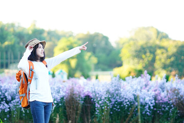 woman in the field with flowers