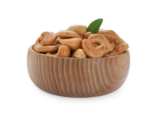 Bowl of tasty organic cashew nuts and green leaf isolated on white