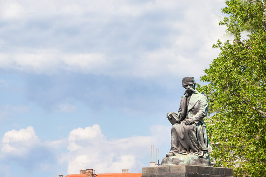 BELGRADE, SERBIA - MAY 30, 2021: Selective blur on the statue to Vuk Stefanovic Karadzic, made in 1932 by Jovanovic, on Vukov Spomenik park of Belgrade. Vuk Karadzic is a serbian linguist. ....