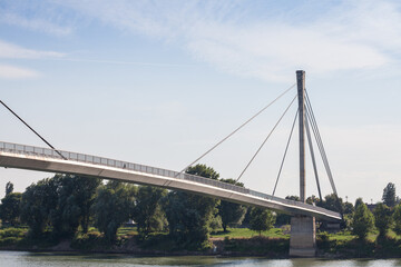 Fototapeta na wymiar Saint Irinej bridge (Most Svetog Irineja) over the Sava river in Sremska Mitrovica (Serbia). Sremska Mitrovica is one of the main cities of the northern Serbian Region of Srem.....