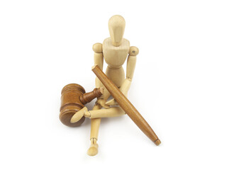 Wooden figurine with broken judge gavel isolated on white background. Injustice and lawlessness...