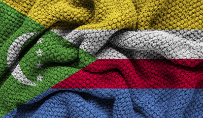 Comoros flag on knitted fabric. 3D-image