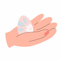 Hand hold easter egg on white background