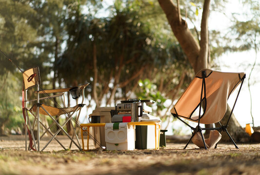 compact camping set for two in warm light, beach side park