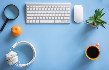 Flat lay, hobby, study and work concept on blue background.