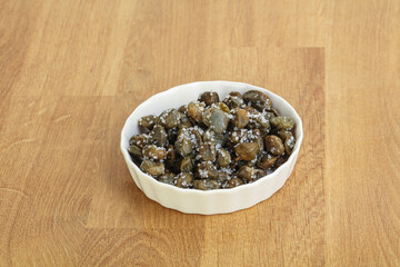 Salted marinated capers snack appetiser