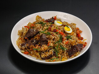 Uzbek traditional plov - rice with meat