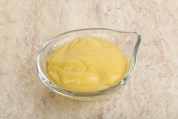 Organic mustard sauce in the bowl