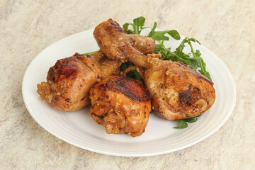 Roasted chicken leg with rucola