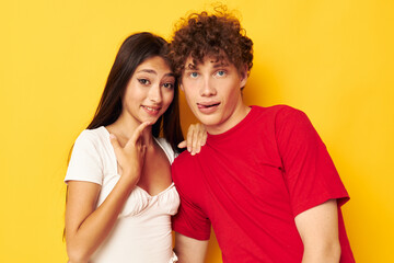 Fototapeta premium young boy and girl hug together antics Lifestyle unaltered