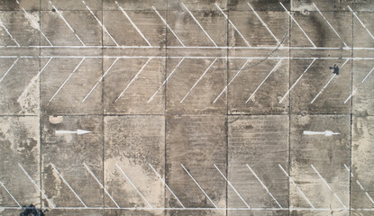 Top view drone shot of empty outdoor old parking lot © Panya