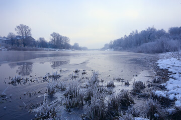 Fototapeta premium freezing river november december, seasonal landscape in nature winter