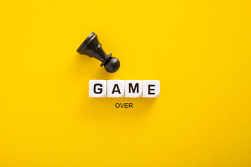 Game Over word and concept. Block letters on bright yellow background