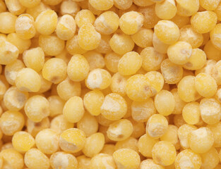 Close-up of millet groats as background.