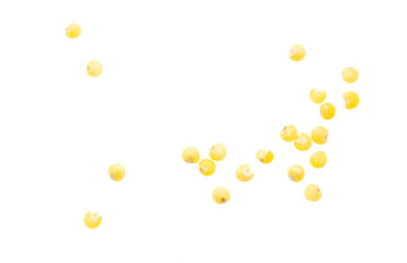 Millet groats isolated on a white background.