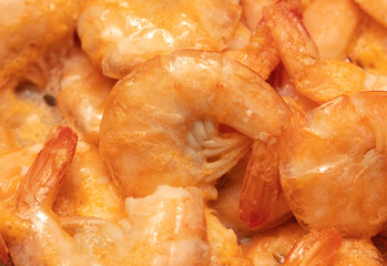 Close-up of boiled shrimp as background.