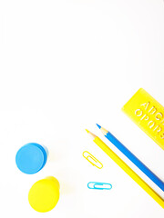 Blue and yellow stationery on white background top view. Design elements for cards, poster, banner. Back to school concept