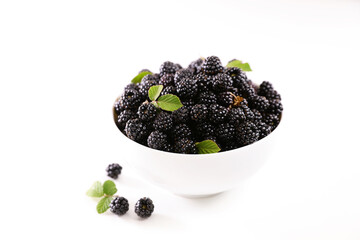 bowl of backberries fruits isolated on white background
