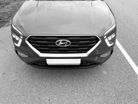 Grodno, Belarus - 11.06.2021: Front bumper of Hyundai Creta 2021 (Hyundai IX25). Black and white photo