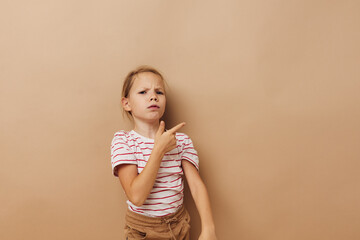 cute little girl in striped t-shirt emotions