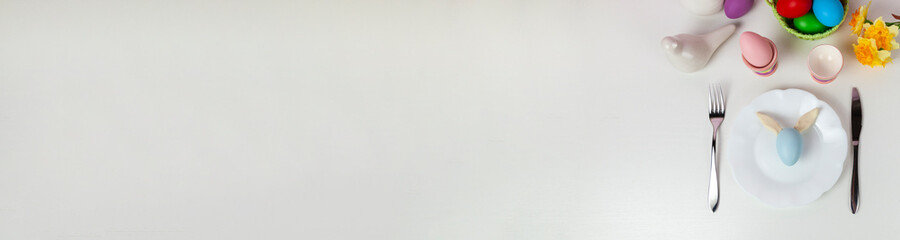 Easter table setting and dinner  festive decorations. Banner.