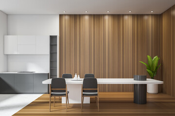 Wooden kitchen set interior with dining table and seats. Copy space