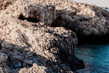 Scenic seashore of Cyprus island with blue clean water and clear sky.