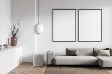 Bright living room interior with two empty white posters, sofa