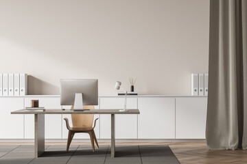 Bright office room interior with empty white wall, desktop