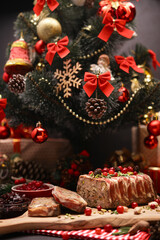 Traditional French terrine covered with bacon and decorated Christmas tree