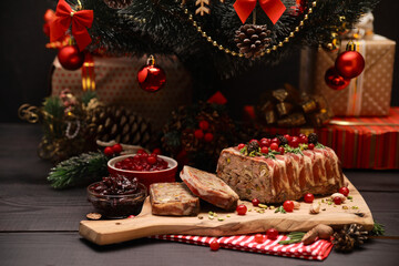 Traditional French terrine covered with bacon and decorated Christmas tree