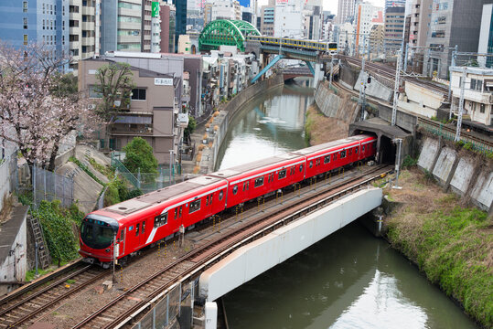 Tokyo, Japan - Mar 22 2021 - Kanda River view from Ochanomizu Bridge near Ochanomizu, Station in Bunkyo, Tokyo, Japan.