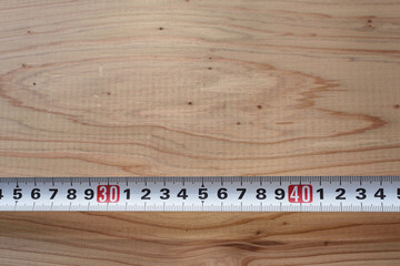 背景素材・木の板とメジャー