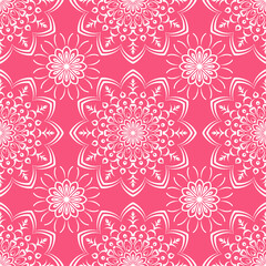Floral seamless background. Graphic drawing in light colors on a pink background.