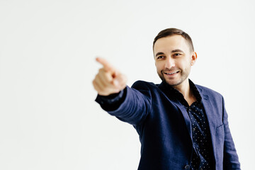 Businessman pressing an imaginary button on white background
