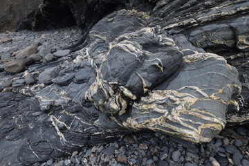 A slate and quartzite boulder at Rusey Beach Cornwall